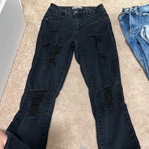 Blue spice distressed skinny jeans